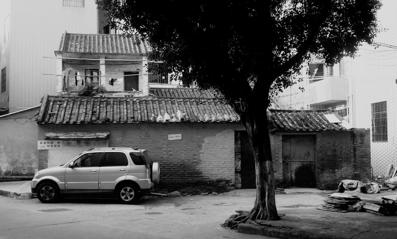 CARS PARKED IN FRONT OF CAR