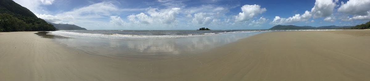 Panoramic view of beach against sky