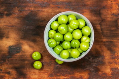 High angle view of green fruits on table