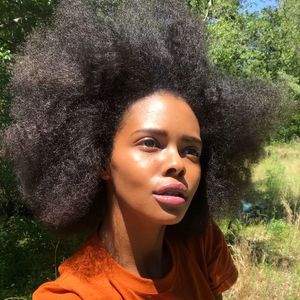 Portrait of young woman looking away