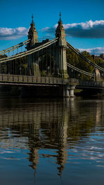 Bridge over river against sky