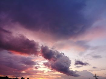 Low angle view of dramatic sky during sunset