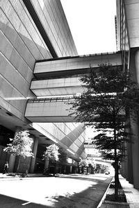 Street amidst buildings against sky