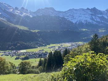 Scenic view of landscape and mountains against sky