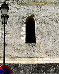 Low angle view of window on wall