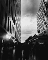 People walking on street in city