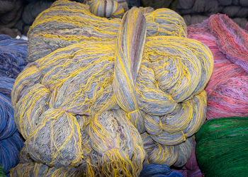 Wool yarn threads, close-up of yarn texture, knitting as a hobby, handicrafts 