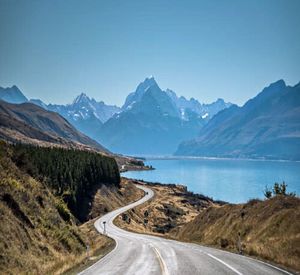 Country road leading towards mountains