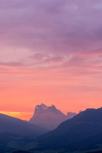 Scenic view of mountains at sunset