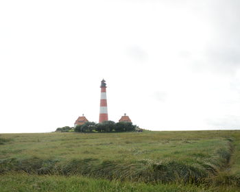 Lighthouse on field