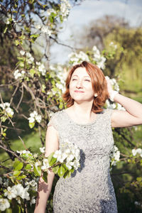 Portrait of beautiful young woman outdoors