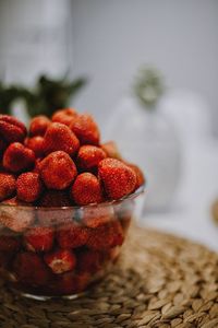 Close-up of strawberries in bowl on table