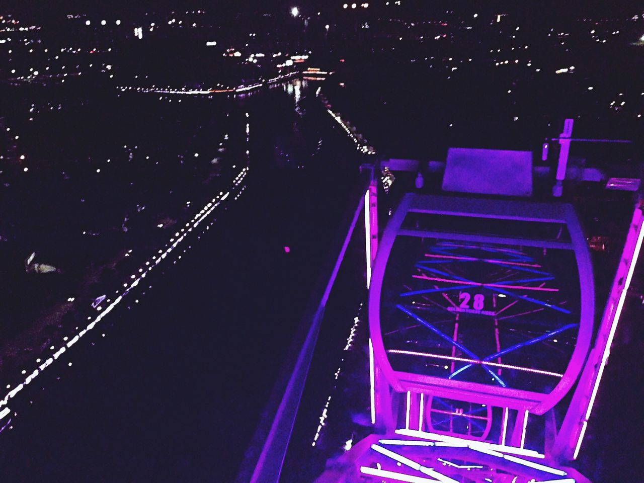 night, illuminated, transportation, high angle view, mode of transport, motion, light trail, lighting equipment, red, long exposure, dark, railing, light - natural phenomenon, speed, the way forward, indoors, no people, absence, land vehicle