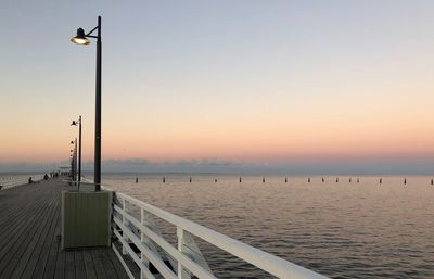 Scenic view of sea against clear sky during sunset