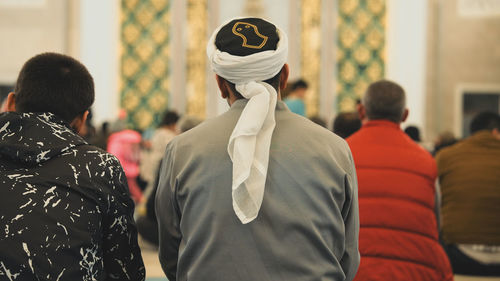 Rear view of woman wearing hat