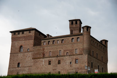 Low angle view of old ruins against sky