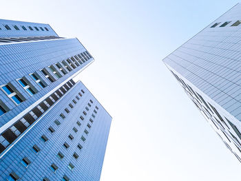 Low angle view of buildings against clear sky