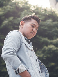 Portrait of young man looking away