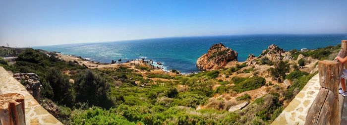 Panoramic shot of sea against clear sky