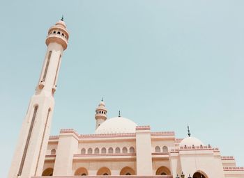 Low angle view of historic mosque against sky