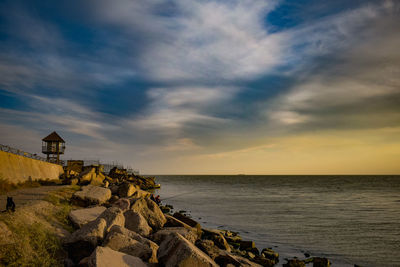 Scenic view of sea against sky during sunset