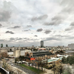 High angle view of buildings in city against sky