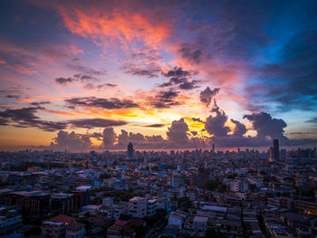 High angle view of townscape against sky during sunset