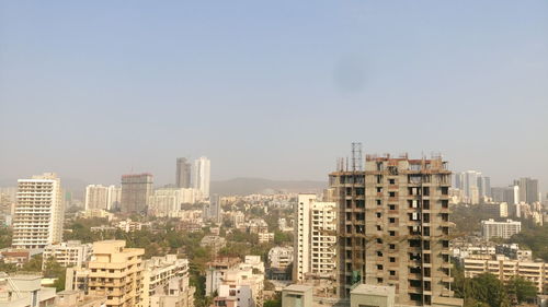 Cityscape against clear sky