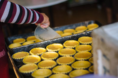 Close-up of person preparing food