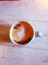 High angle view of coffee cup on table