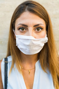 Portrait of woman wearing mask