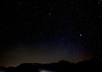 Low angle view of star field against sky at night