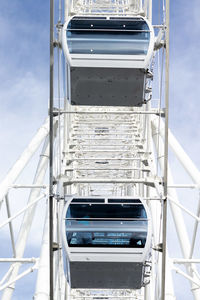 Close-up of telephone booth against sky