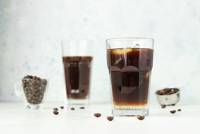 Espresso tonic, refreshment summer drink with tonic water, coffee and ice. trendy coffee drink.