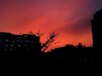 Silhouette of buildings at sunset