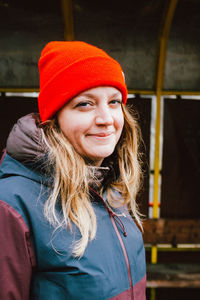 Portrait of smiling woman in hat