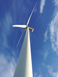 Low angle view of windmill against sky