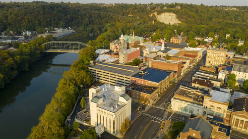 High angle view of townscape by river