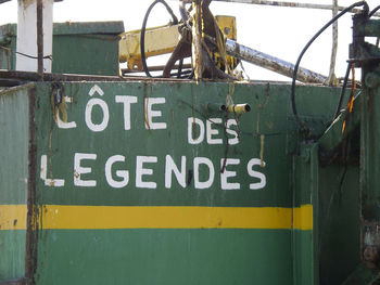 Close-up of information sign on road