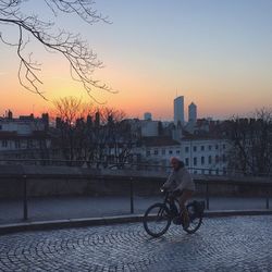 View of cityscape against sky during sunset