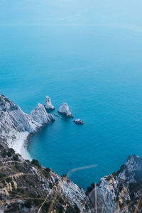 High angle view of sea and rocks