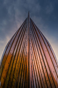 Low angle view of metallic structure against sky