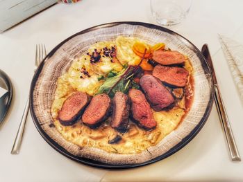 High angle view of breakfast in plate on table