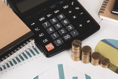 High angle view of coins on table