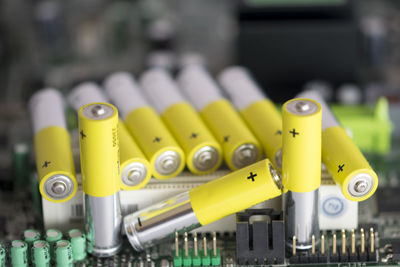 Close-up of batteries on table