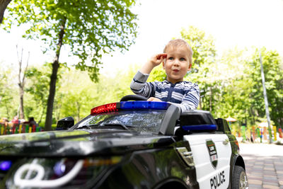 Portrait of boy in car