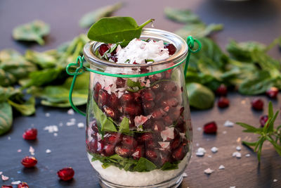 Close-up of fruits in jar on table