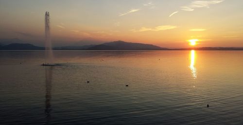 Scenic view of sunset over sea