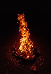 Bonfire on field at night