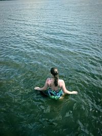 High angle view of woman in river